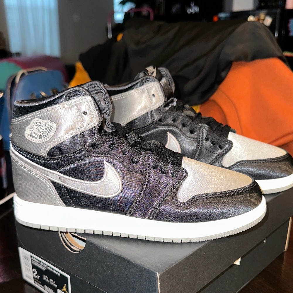 Brand new Nike Air Jordan 1 High Black and Metallic Sneakers